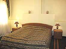 ООО «ГРК «Корона»  Изумрудный Люкс двухкомнатный двухместный спальная комната фото 